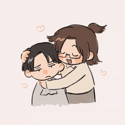 Woman Petting Boy's Head With Hearts GIF