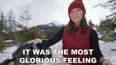 Woman Petting Dog In Snow Glorious Feeling GIF