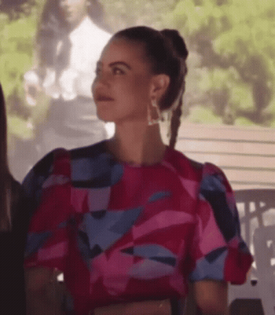 Woman Pink Blue Dress With Others On Bench GIF