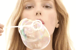 Woman Playing Bubbles GIF