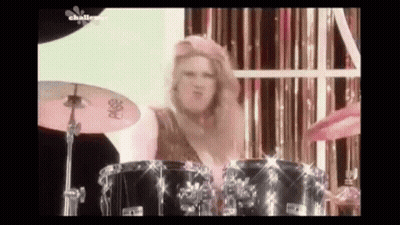 Woman Playing Drums On Stage GIF