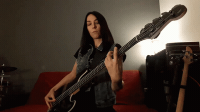 Woman Playing Fender Bass Guitar GIF