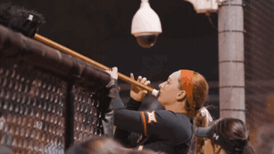 Woman Playing Flute With X On Chest GIF