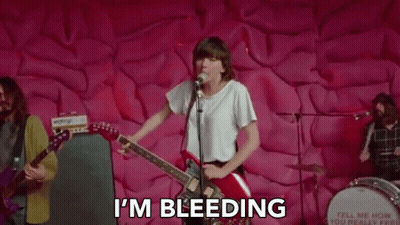 Woman Playing Guitar And Singing GIF