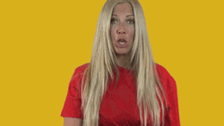 Woman Playing Imaginary Smallest Violin GIF
