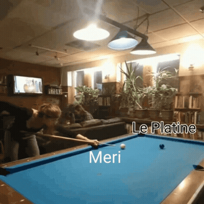 Woman Playing Pool With Meri On Table GIF
