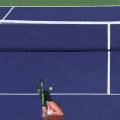 Woman Playing Tennis In Front Of BNP Pari Ad GIF