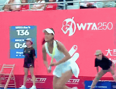 Woman Playing Tennis In Front Of WTA250 Banner GIF