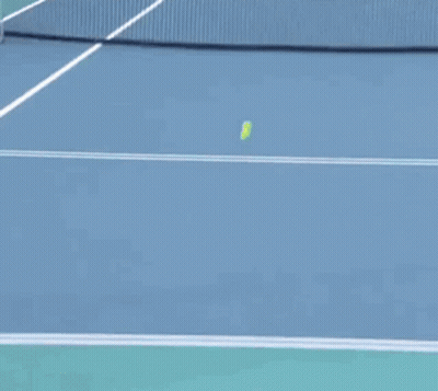 Woman Playing Tennis On Court With Itaú Advertisement GIF