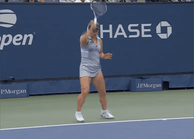 Woman Playing Tennis With Chase Sign GIF
