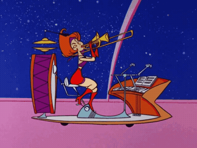 Woman Playing Trombone With Drum And Keyboard GIF