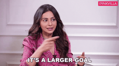 Woman Pointing And Saying Larger Goal GIF