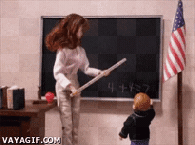 Woman Pointing At Blackboard With Child Looking On GIF