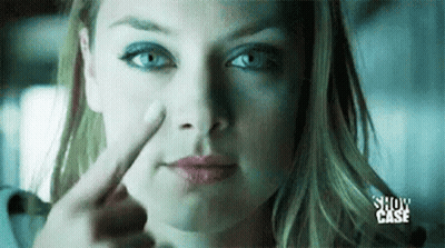Woman Pointing Finger At Nose GIF
