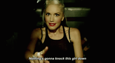 Woman Pointing Nothing's Gonna Knock This Girl Down GIF