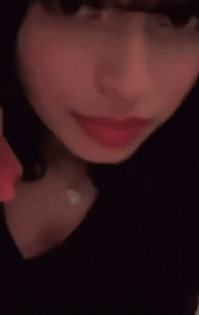 Woman Pointing To Forehead GIF