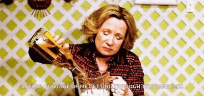 Woman Pouring Alcohol Into Pitcher GIF