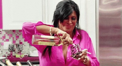 Woman Pouring Bottle Of Wine Into Glass GIF