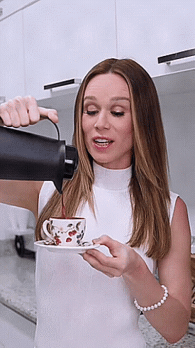 Woman Pouring Coffee From Thermos GIF