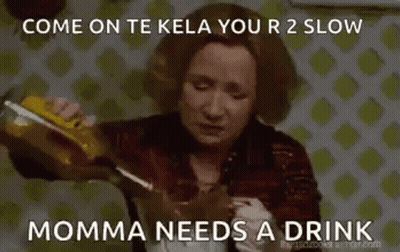 Woman Pouring Drink Into Glass GIF