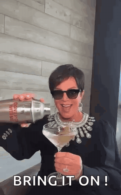 Woman Pouring Drink Into Martini GIF