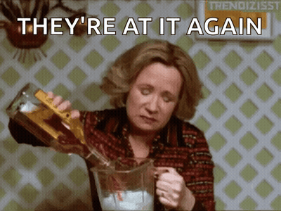 Woman Pouring Drink Saying They're At It Again GIF