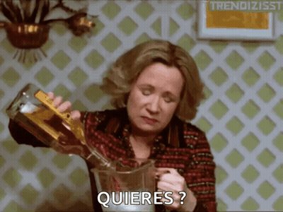 Woman Pouring Drink With Quieres GIF