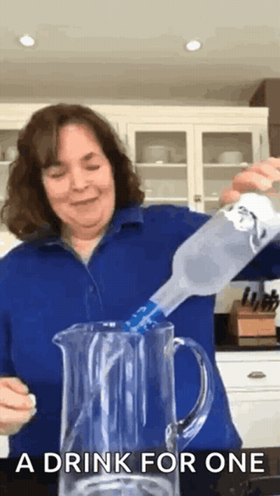 Woman Pouring Into Pitcher Saying Drink For One GIF