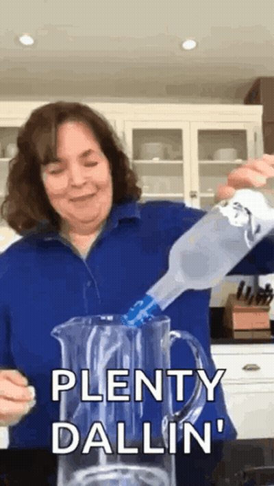 Woman Pouring Vodka Bottle Into Pitcher Saying Plenty Dallin GIF