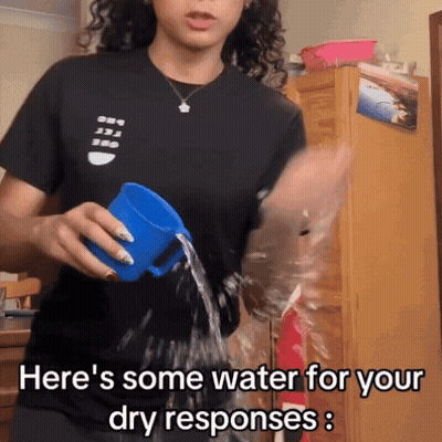 Woman Pouring Water From Blue Cup GIF