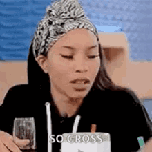 Woman Pulling Her Tongue Out Saying Gross GIF