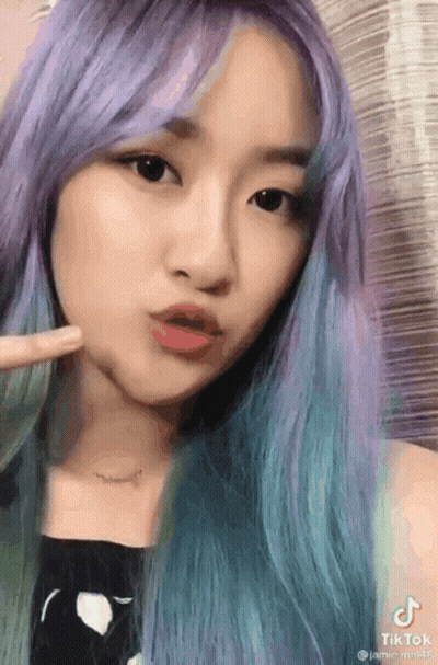 Woman Purple Blue Hair Making Funny Face Necklace GIF