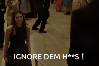 Woman Purple Dress Tells Man Ignore Dem H**s GIF