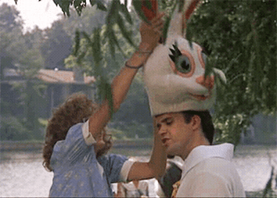 Woman Putting Bunny Head On Man GIF