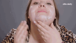 Woman Putting Lotion On Face And Neck GIF