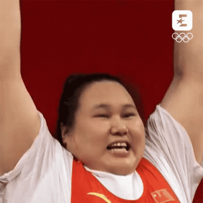 Woman Raising Arms In Red And White Shirt GIF