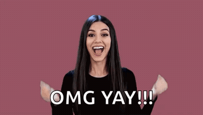 Woman Raising Fist Saying Omg Yay GIF
