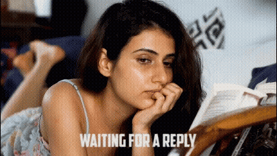 Woman Reading Book Waiting For Reply GIF