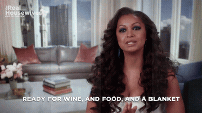 Woman Ready For Wine And Food And A Blanket GIF