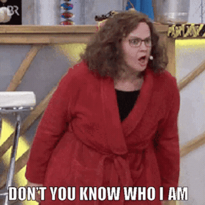 Woman Red Robe Funny Face Don't You Know Who I Am GIF