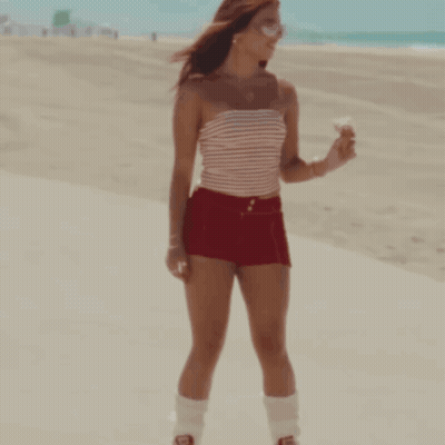 Woman Red Shorts Striped Top Holding Ice Cream GIF