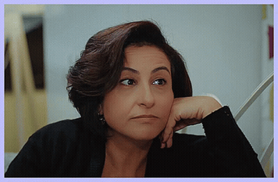 Woman Resting Hand On Chin With Serious Look GIF