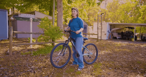 Woman Riding Cycle GIF