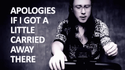 Woman Riding Exercise Bike Apologies GIF