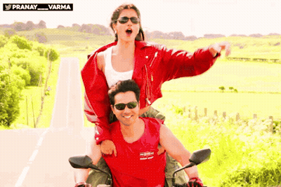 Woman Riding On Back Of Man On Motorcycle GIF