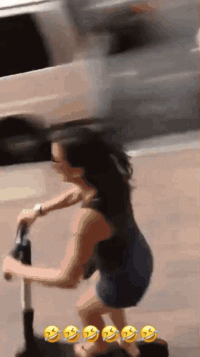 Woman Riding Scooter With Smiley Faces GIF
