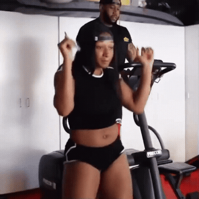Woman Riding Treadmill Next To Man GIF