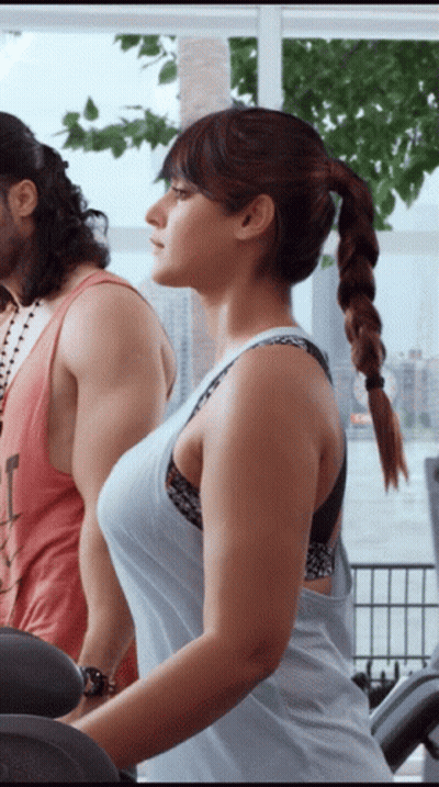 Woman Riding Treadmill With Braided Ponytail GIF