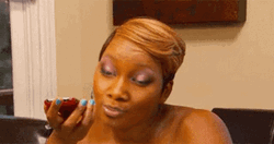 Woman Rolls Eyes While Talking To Her Phone GIF