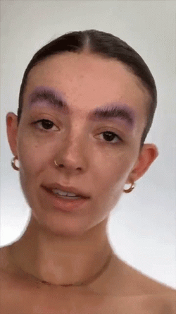 Woman Rotates Camera GIF